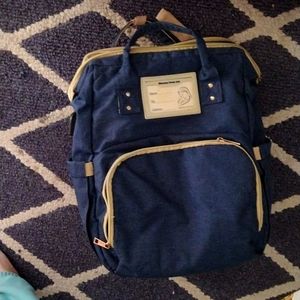 Diaper bag. Navy blue. Built in bassinet/keeps bottles warm.